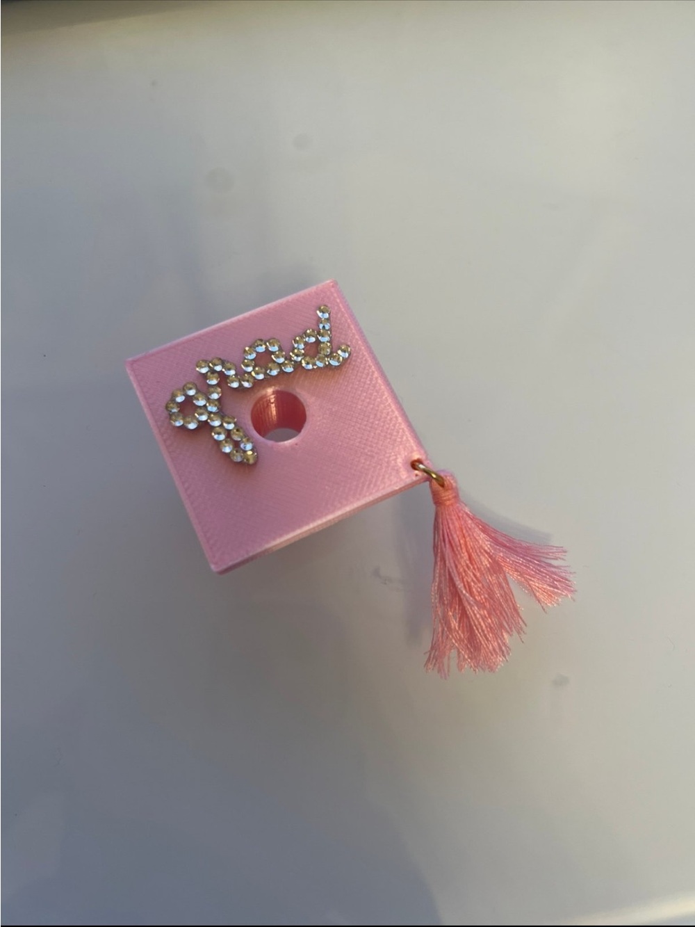 The Fawn Doe Pink 'Grad’ Graduation Cap Tassel Straw Topper